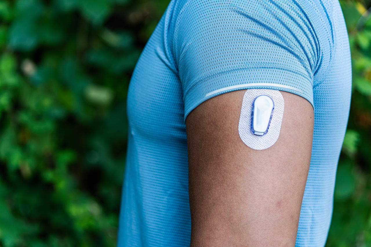 CGM Patch on a person’s arm 