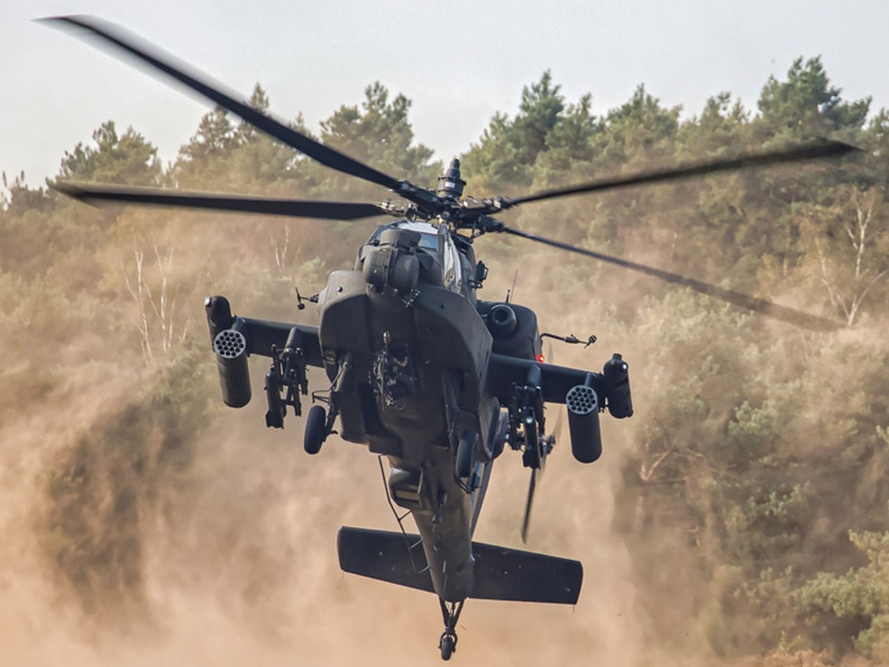 Apache attack helicopter in flight.