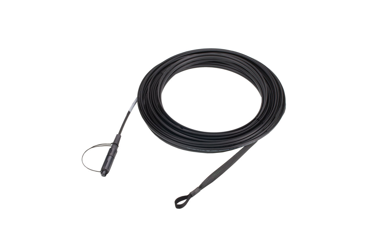 A Molex fiber optic drop cable with cap installed. 